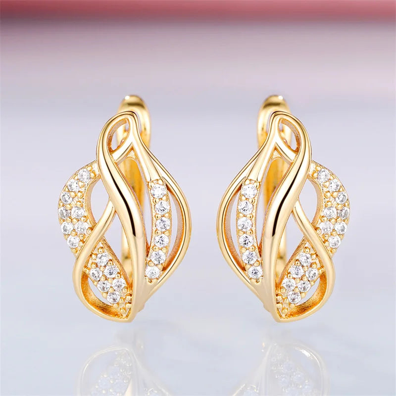 Huitan – boucles d'oreilles créoles en forme de feuille chaude pour femmes, accessoires fantaisie à la mode, pour usage quotidien, fête de mariage, mariée élégante, bijoux modernes