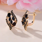 Glamorous Golden Leaf Clip Earrings - Shimmering Black Zircon Stones for Women - Fashion-Forward Wedding Jewelry